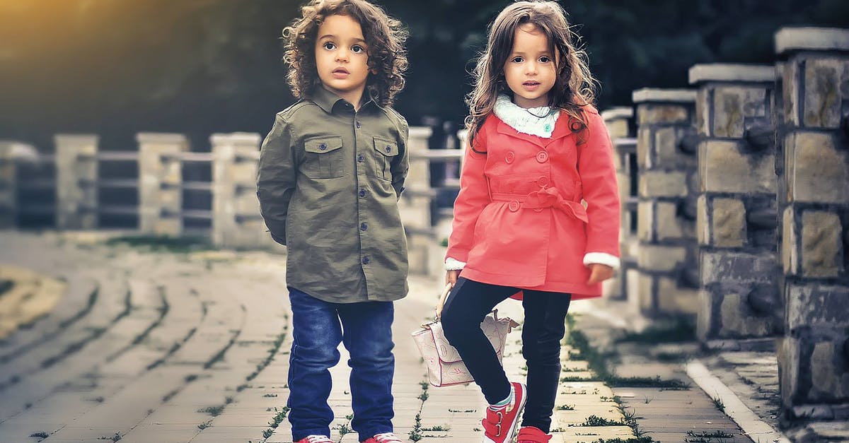 Why do snipers wear dresses? - Two Children Standing Near Concrete Fence Why do snipers wear dresses? - Two Children Standing Near Concrete Fence