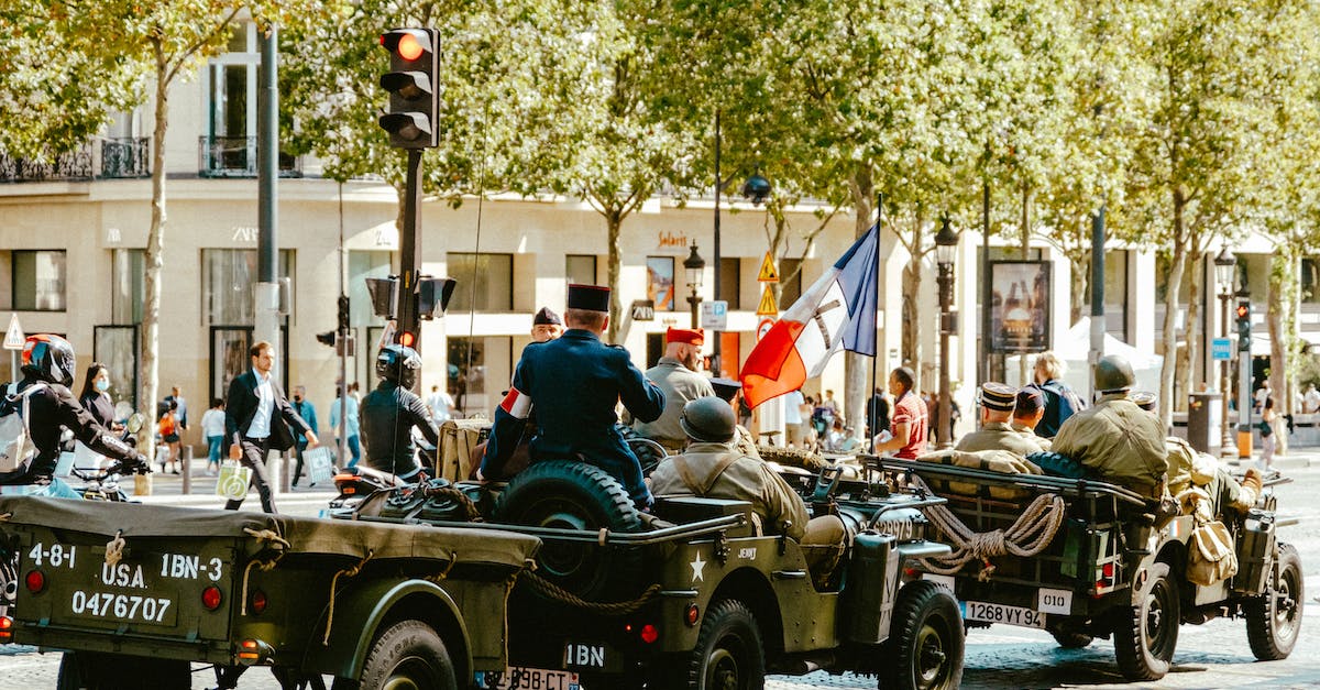 Why do the Galbadian soldiers not question Selphie's presence in the Missile Base? - People Riding on Green Military Jeep