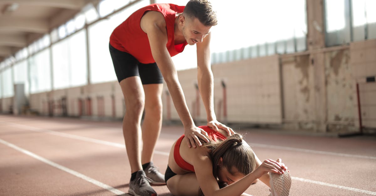 Why do top season crusaders on 4-person team leaderboards have dexterity and intelligence items? - Professional male sportsman helping woman touching knees with head while female sitting on running track and doing stretching exercise Why do top season crusaders on 4-person team leaderboards have dexterity and intelligence items? - Professional male sportsman helping woman touching knees with head while female sitting on running track and doing stretching exercise