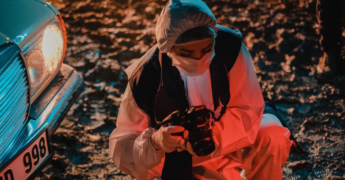 Why does apprehending a civilian shooter make the police shoot at me? - Woman photographing evidences on crime scene at night Why does apprehending a civilian shooter make the police shoot at me? - Woman photographing evidences on crime scene at night