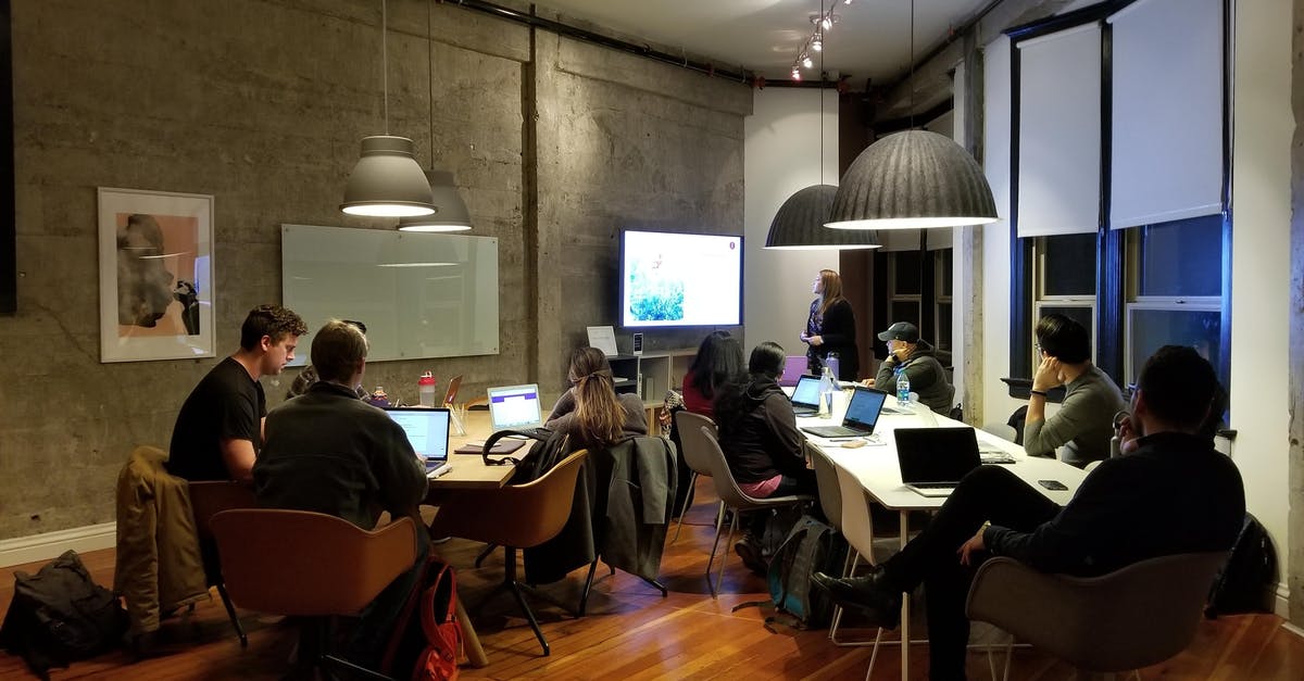 Why does connecting a laptop to a TV via HDMI cause a framerate drop? - People Gathered Inside One Room