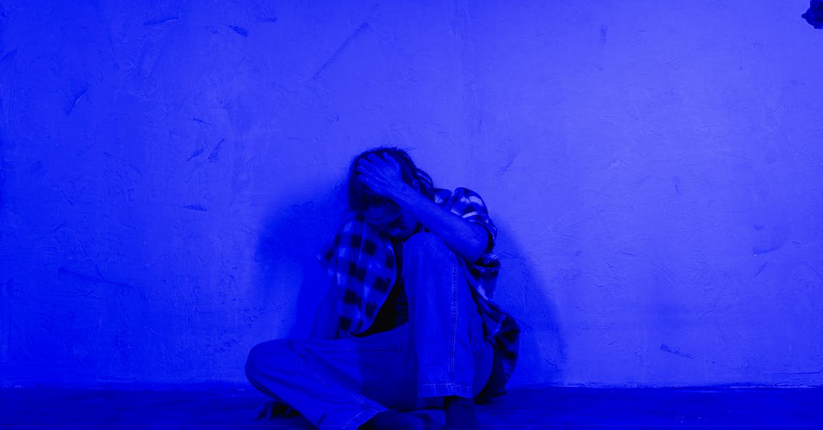 Why does drilling underwater hurt me so much? - Woman in Black and White Scarf Sitting on Floor Why does drilling underwater hurt me so much? - Woman in Black and White Scarf Sitting on Floor