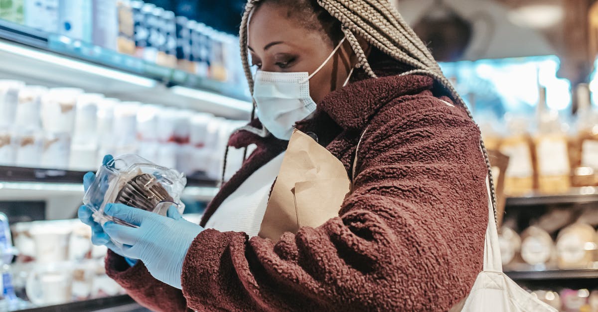 Why does /execute store refuse to update an NBT number when provided with a scoreboard value? - Black female shopper reading label on food in supermarket