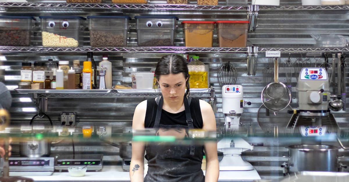 Why does my mob grinder not work in minecraft - Woman in Black Tank Top Standing in Front of Food Display Counter