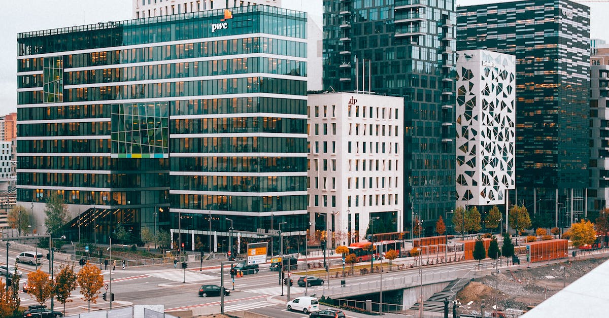 Why does my opponent keep driving into a wall? - Modern city district with glass buildings