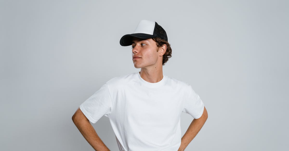 Why does short pressing the left shift key switch the view mode in addition to increasing the throttle? - Man in White Crew Neck T-shirt Wearing Black Fedora Hat