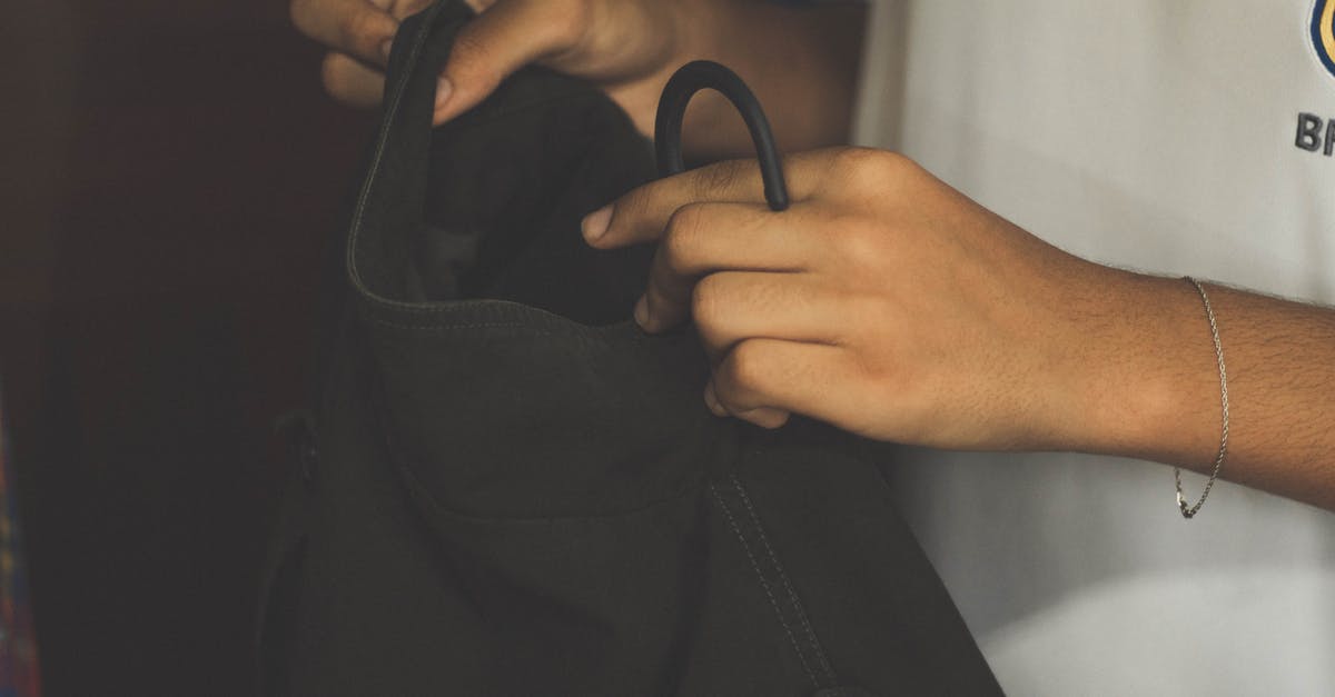 Why does the skins hanger make me exit the game? - Person Holding Black Shirt Why does the skins hanger make me exit the game? - Person Holding Black Shirt