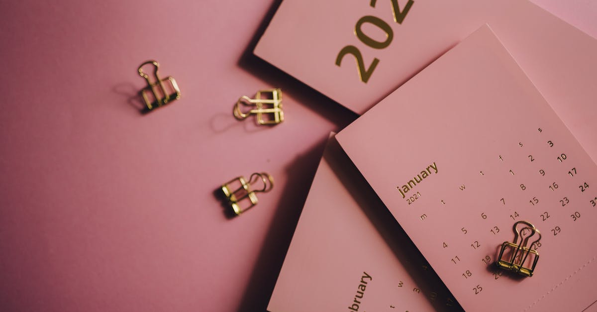 Why does the year only go from March to October? - Overhead view of collection of modern monthly calendars near metal clips on pink table Why does the year only go from March to October? - Overhead view of collection of modern monthly calendars near metal clips on pink table