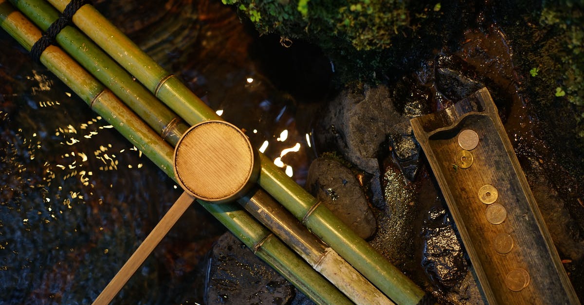 Why does water not flow to the right in this pipe? - Bamboo water pipes with dipper near brook Why does water not flow to the right in this pipe? - Bamboo water pipes with dipper near brook