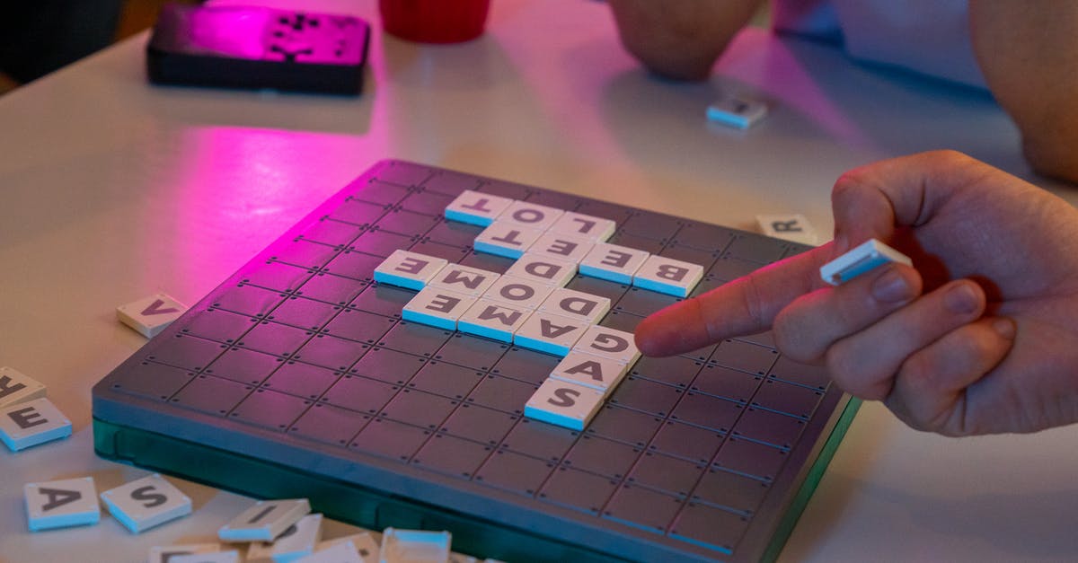 Why does Words with Friends say I can make more points? - A Person Pointing at a Scrabble Tile Why does Words with Friends say I can make more points? - A Person Pointing at a Scrabble Tile