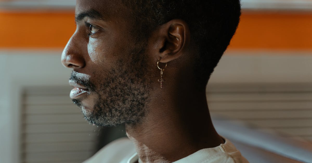 Why doesn't my character/universe/profile sync between computers? [closed] - Man in White Crew Neck Shirt With An Earring
