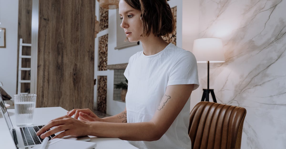 Why doesn't my character/universe/profile sync between computers? [closed] - Woman in White Crew Neck T-shirt Using Macbook Air