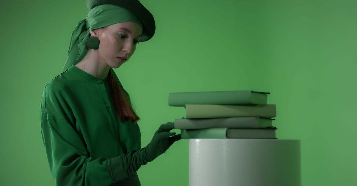 Why don't I have any books to place on the pedestal for "At the Summit of Apocrypha"? - Woman in Green Long Sleeve Dress Touching Green Books Why don't I have any books to place on the pedestal for "At the Summit of Apocrypha"? - Woman in Green Long Sleeve Dress Touching Green Books