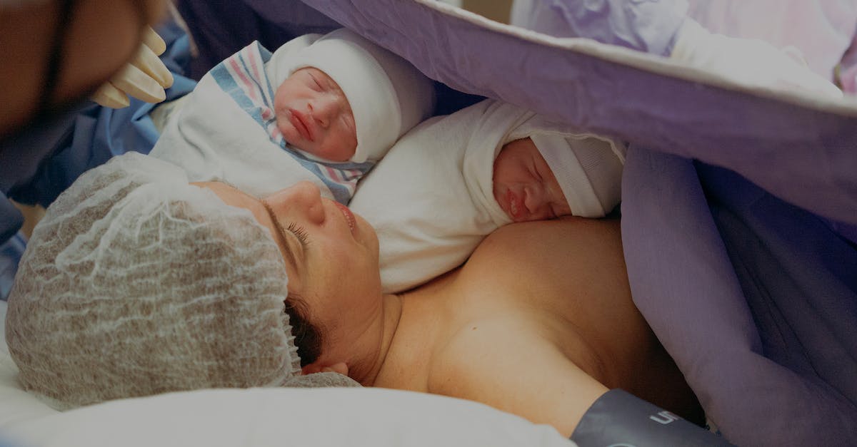 Why don't my female dwellers give birth to children? - Woman with her Newborn Twins on a Hospital Bed Why don't my female dwellers give birth to children? - Woman with her Newborn Twins on a Hospital Bed
