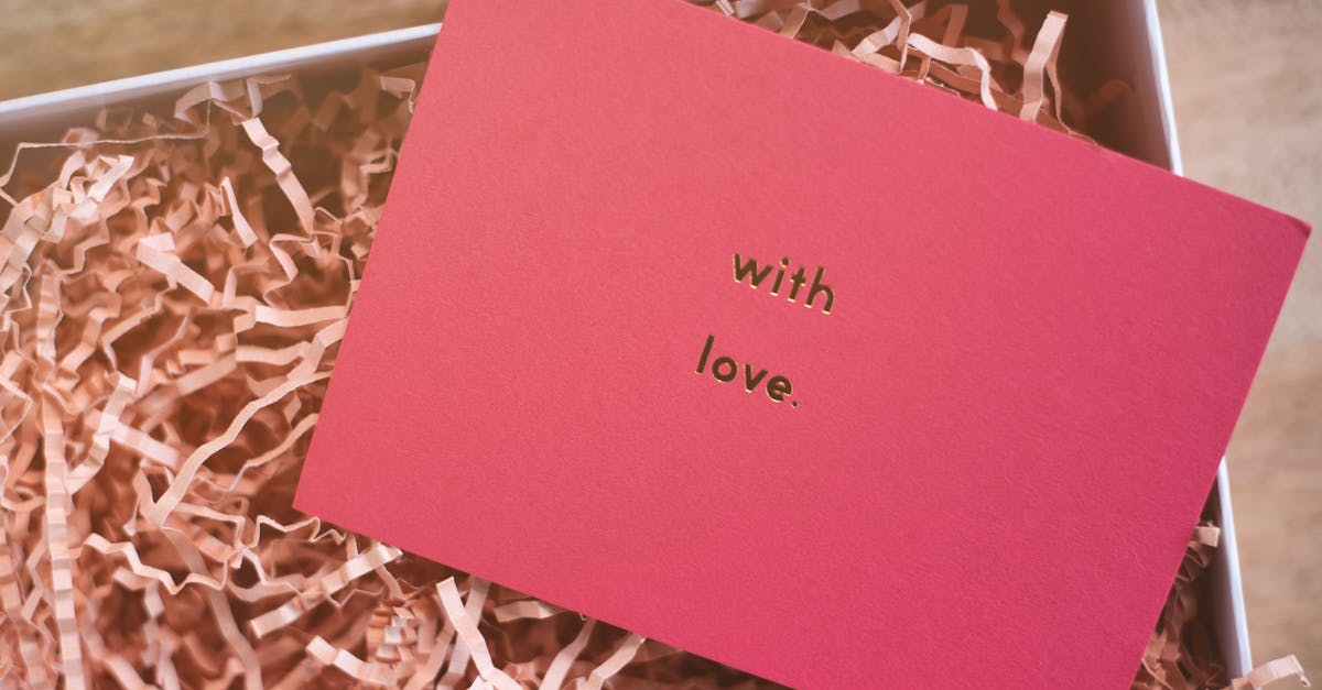 Why I cannot craft premium versions of some cards? - From above of rectangular shaped greeting card representing With Love inscription on cardboard box with organic shavings