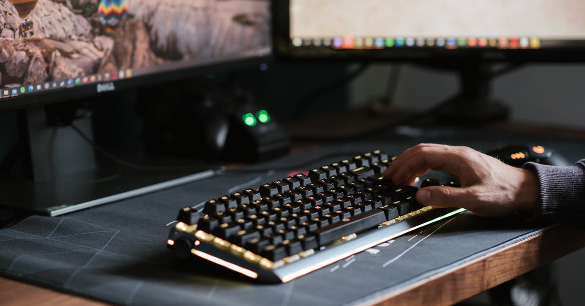 Why I cannot play overwatch in full screen mode? - Crop anonymous male using contemporary computer with big monitors and typing on backlit keyboard Why I cannot play overwatch in full screen mode? - Crop anonymous male using contemporary computer with big monitors and typing on backlit keyboard
