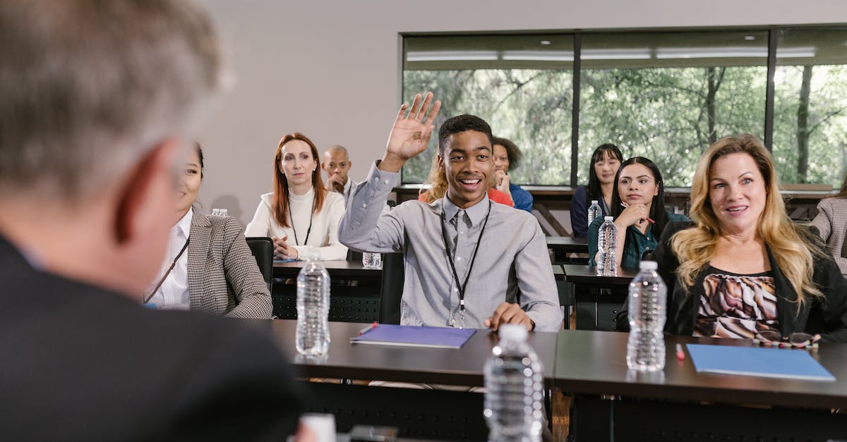 Why is Minecraft asking for 3 questions instead of 1? - A Young Man Raising his Hand at a Business Conference Why is Minecraft asking for 3 questions instead of 1? - A Young Man Raising his Hand at a Business Conference