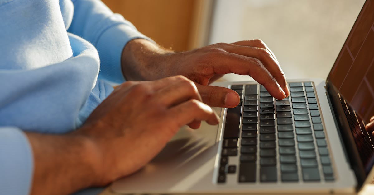 Why is my password not working in minecraft? [closed] - Person in Blue Long Sleeve Shirt Using Macbook Pro