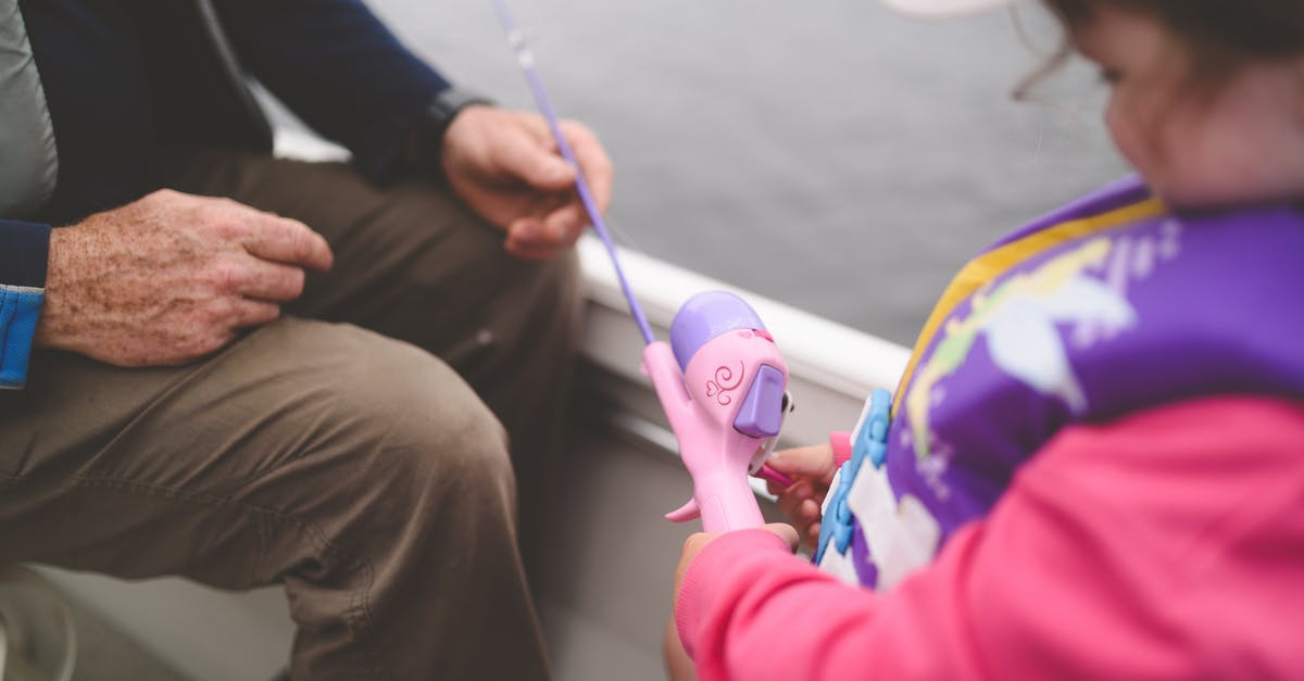 Why is my sword a fishing rod? - A Girl Holding a Pink Fishing Rod Toy Why is my sword a fishing rod? - A Girl Holding a Pink Fishing Rod Toy