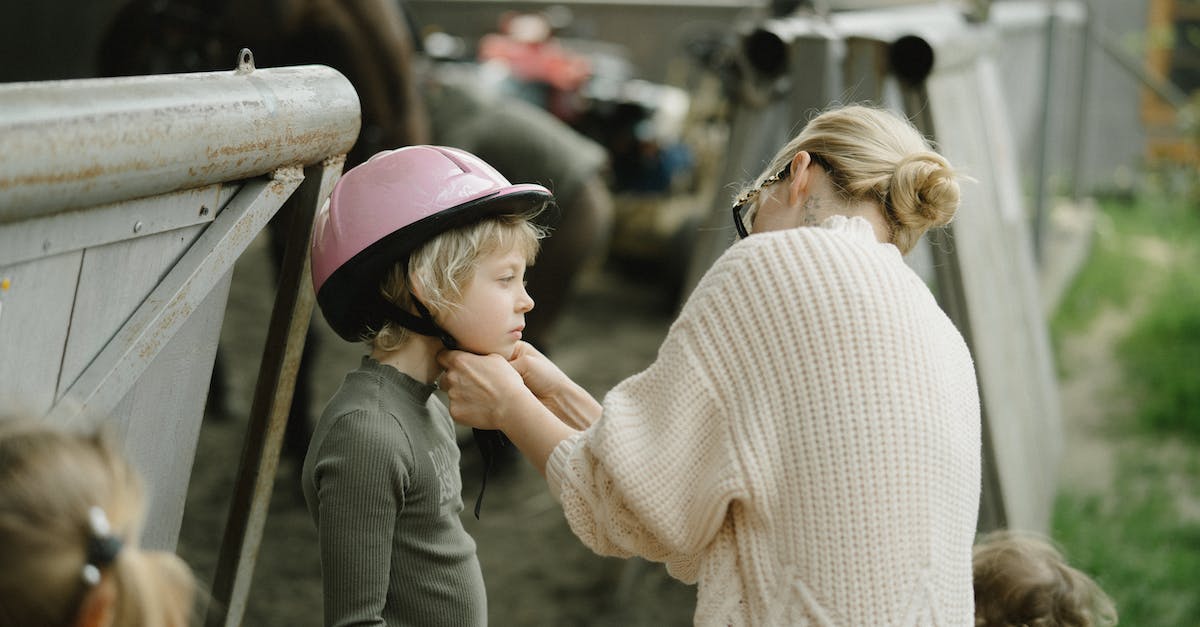 Why is the horned helmet representative of dragonborn? - Woman in White Sweater and Pink Hat