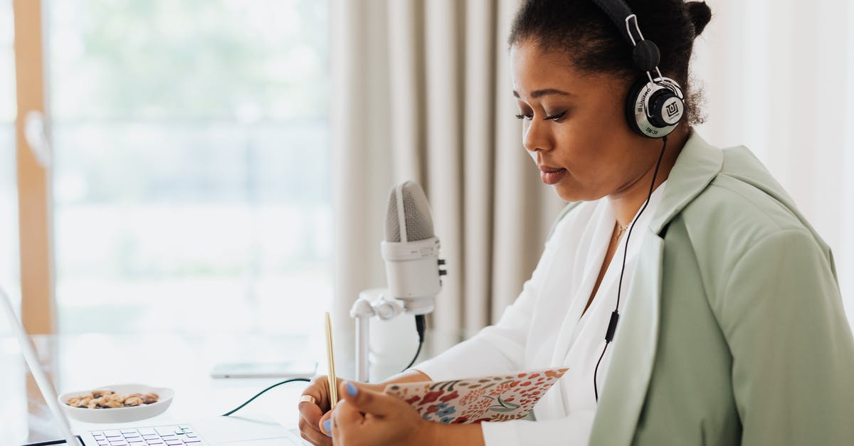 Why is this arithmetic combinator not working? - Woman Sitting in Headphones with a Laptop and a Microphone Next to Her Reading from a Notebook 