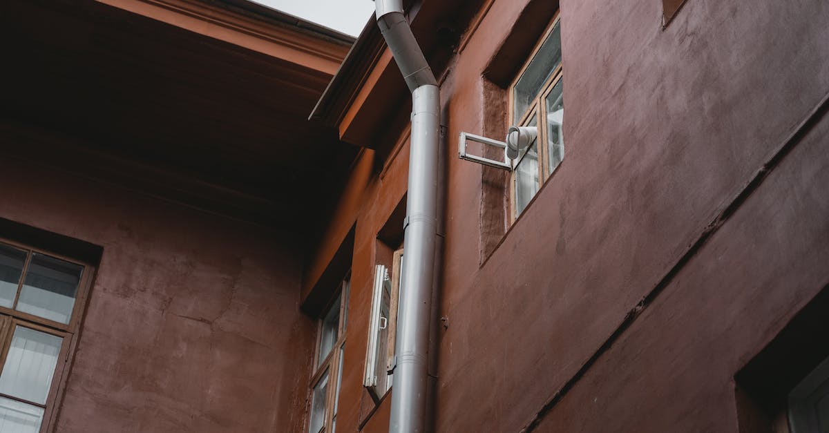 Why is this decoupler attached wrong? - Low Angle Shot of a Building Chimney Why is this decoupler attached wrong? - Low Angle Shot of a Building Chimney
