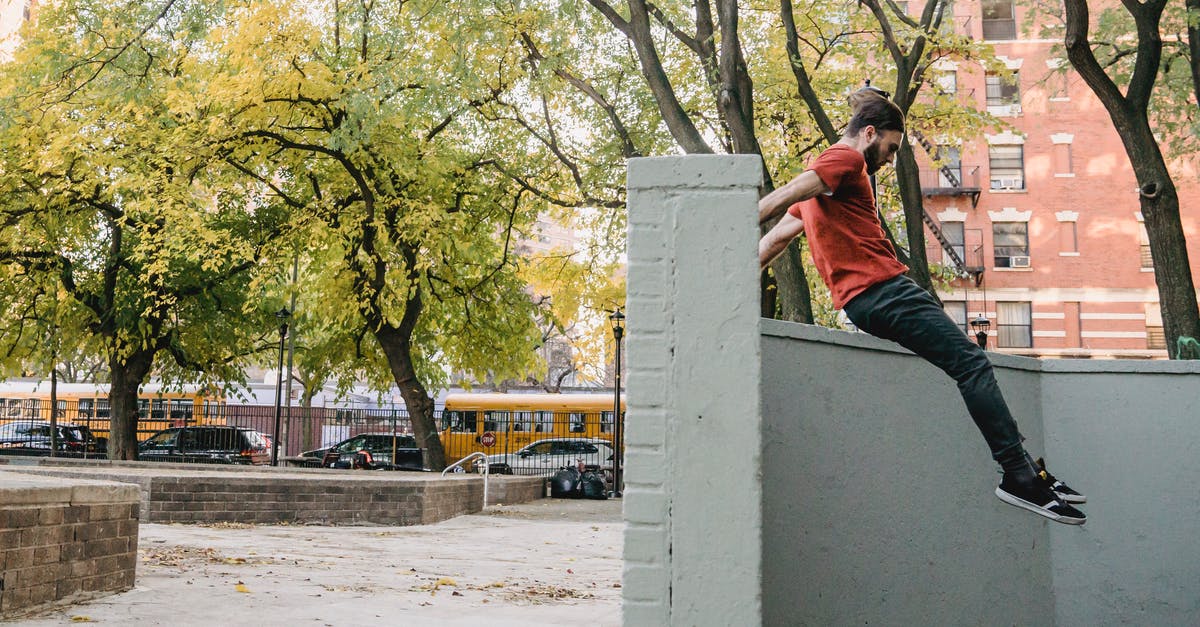 Why is vault 75 quest not activating upon discovery? - Side view of young unshaven male athlete in casual wear jumping above fence while practicing extreme sport in town Why is vault 75 quest not activating upon discovery? - Side view of young unshaven male athlete in casual wear jumping above fence while practicing extreme sport in town