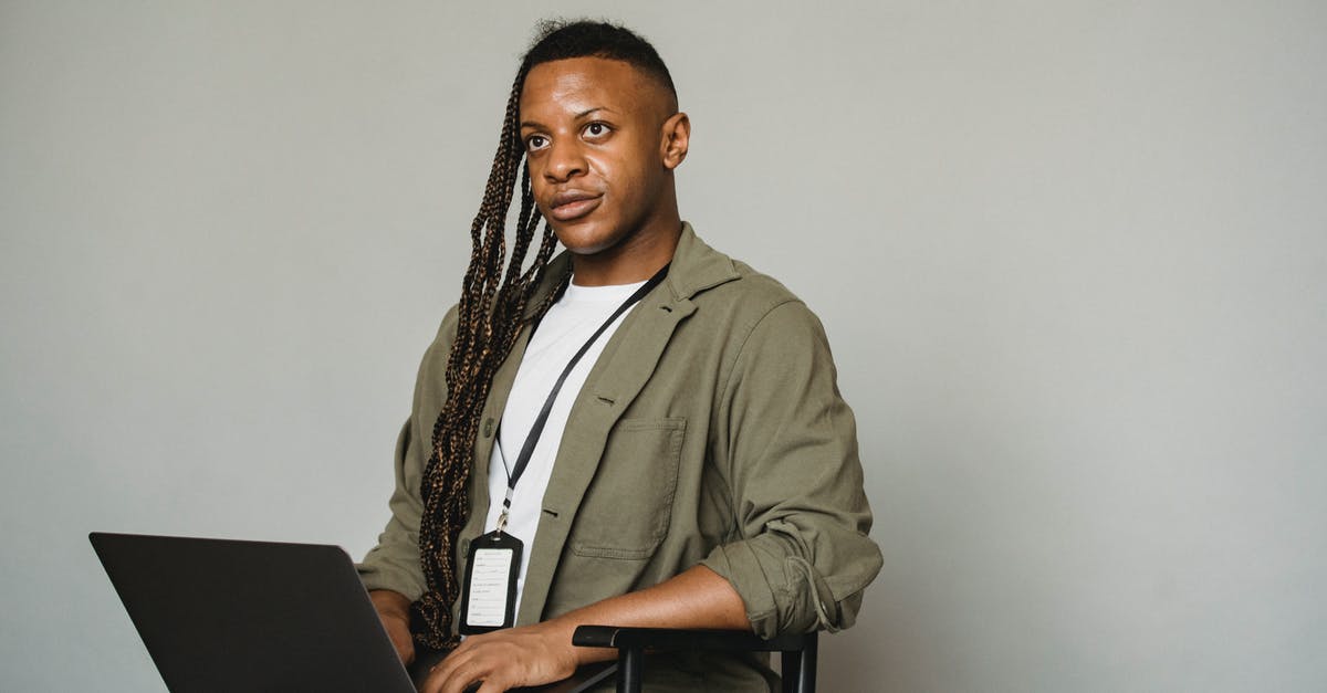 Why isn't it accepting any of my Nick name? [duplicate] - Black transgender man working on laptop