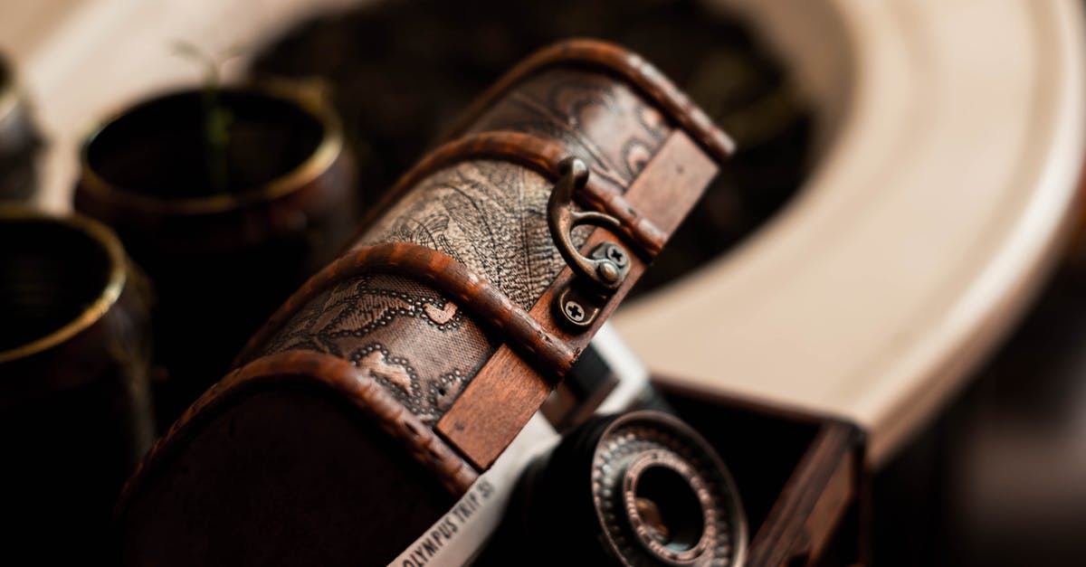 Why items such as leather strips keep disappearing from my chests? - Retro film camera in small wooden box placed on table