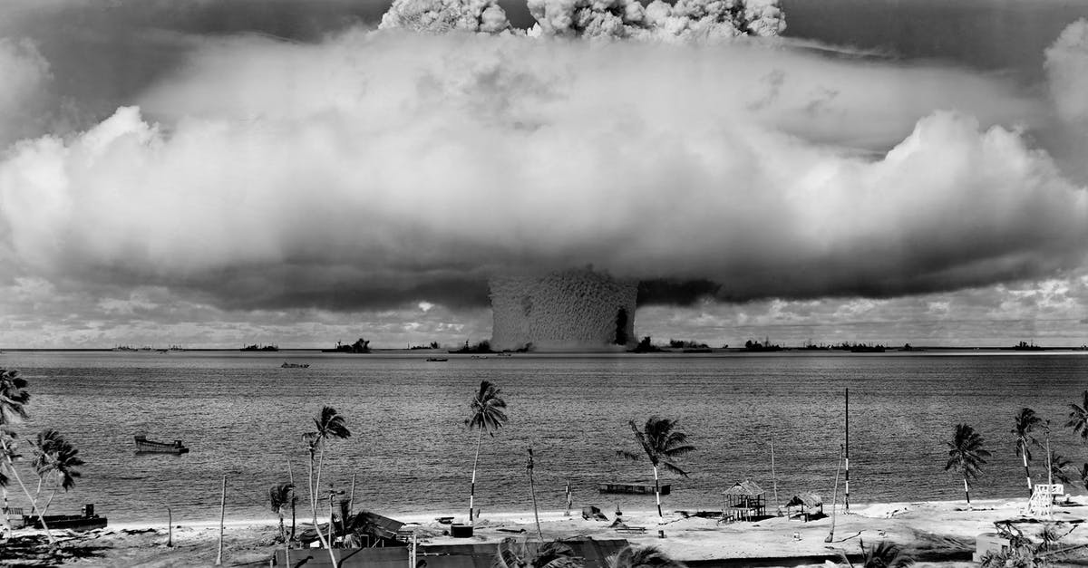Why my mother-ship core cannot blast the photon cannon? - Grayscale Photo of Explosion on the Beach