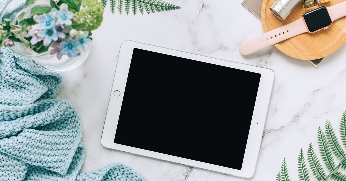 Why should I "watch" a nearby Pokémon? - IPad Lying on a Marble Counter with Other Accessories