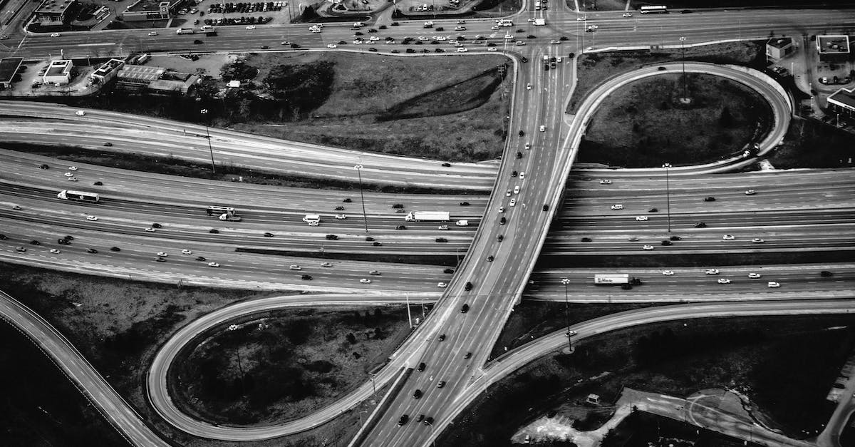 Why should I use a highway ramp? - Greyscale Photography of Road