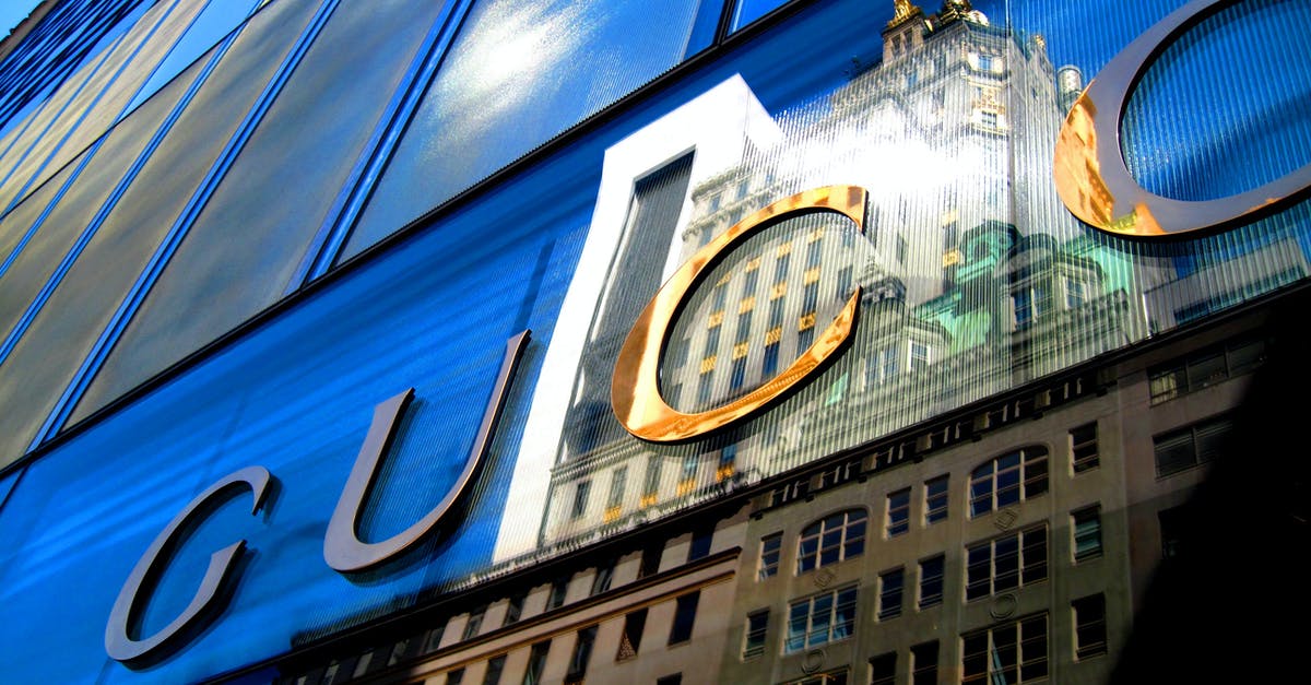 Why there's a hole with a commercial building on it? - Low Angle View of Building Why there's a hole with a commercial building on it? - Low Angle View of Building