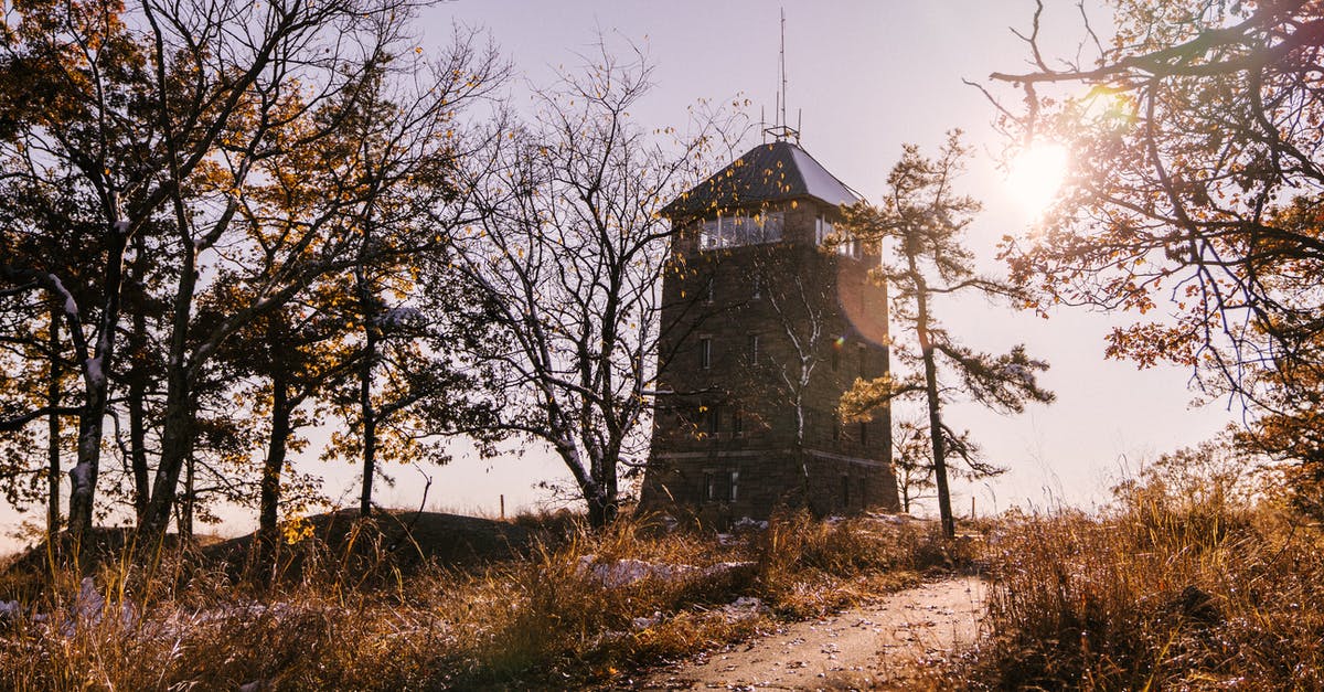 Why use the existing radio tower? - Tower with antenna on top in suburb area