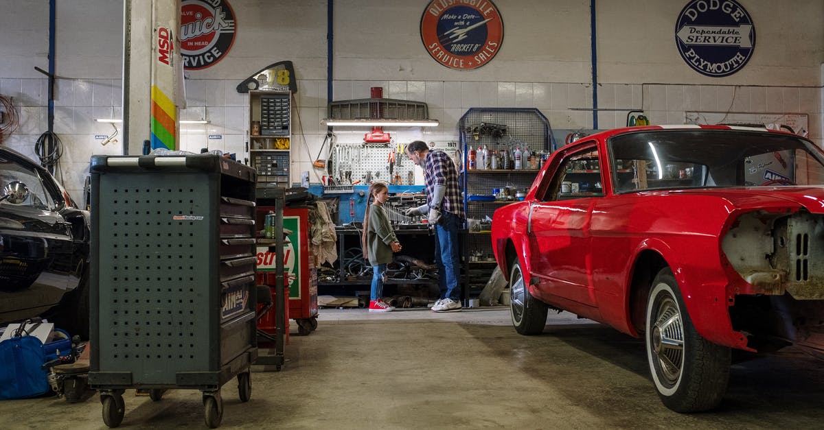 Why wasn't my car saved in Trevor's garage? - Red Car Parked Beside Red Car
