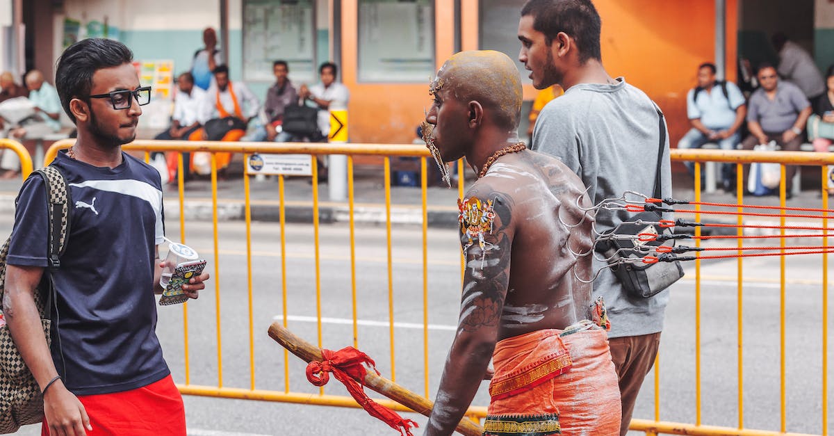 Why won't Gurdurr evolve in conquest? - Man in Orange Cloth and Hooks in a Back Walking on Street Why won't Gurdurr evolve in conquest? - Man in Orange Cloth and Hooks in a Back Walking on Street