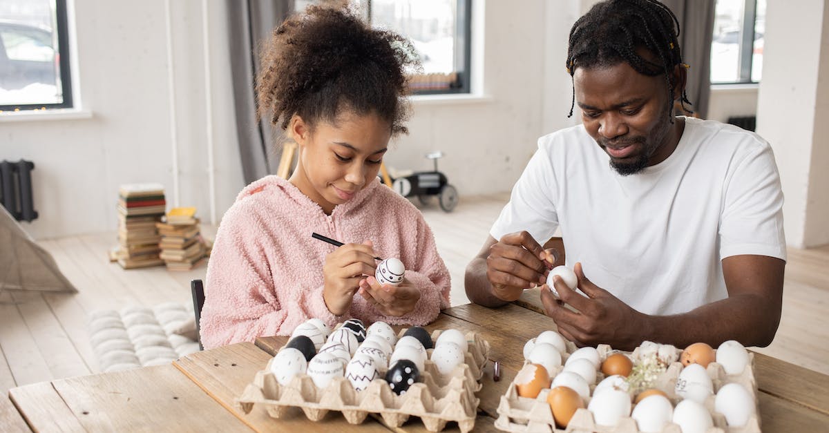Why won't my Riolu evolve? - Man in White Crew Neck Shirt Holding White Egg
