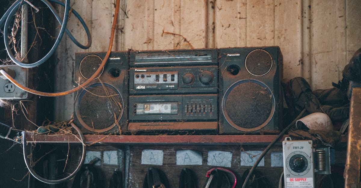 Why won't Pokemon Go let me use my old Google Play Account? - Old fashioned obsolete compact stereo system covered with dust placed on shelf near wooden wall in workshop with tools and wires
