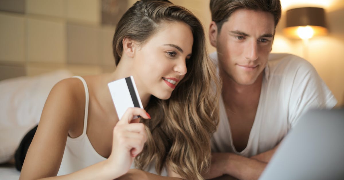 Why would I want to use the Love Your Enemy trump card? - Cheerful couple making online purchases at home Why would I want to use the Love Your Enemy trump card? - Cheerful couple making online purchases at home