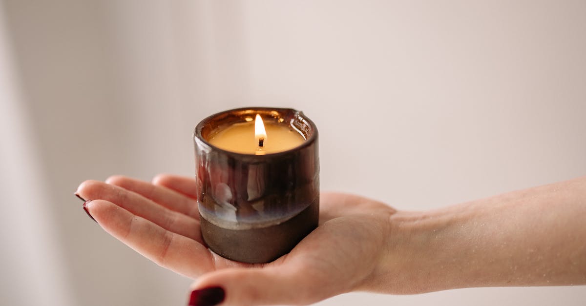 Why would someone "burn" their paragon? - Person Holding Black Candle Holder Why would someone "burn" their paragon? - Person Holding Black Candle Holder