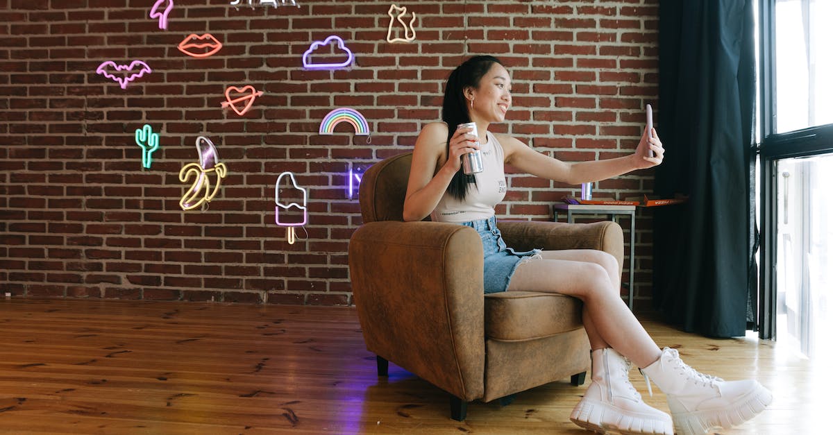 Will Boots of Swiftness + Tenacity be a good item for Off-Tank champions? - A Woman Sitting on a Chair Holding Her cellphone