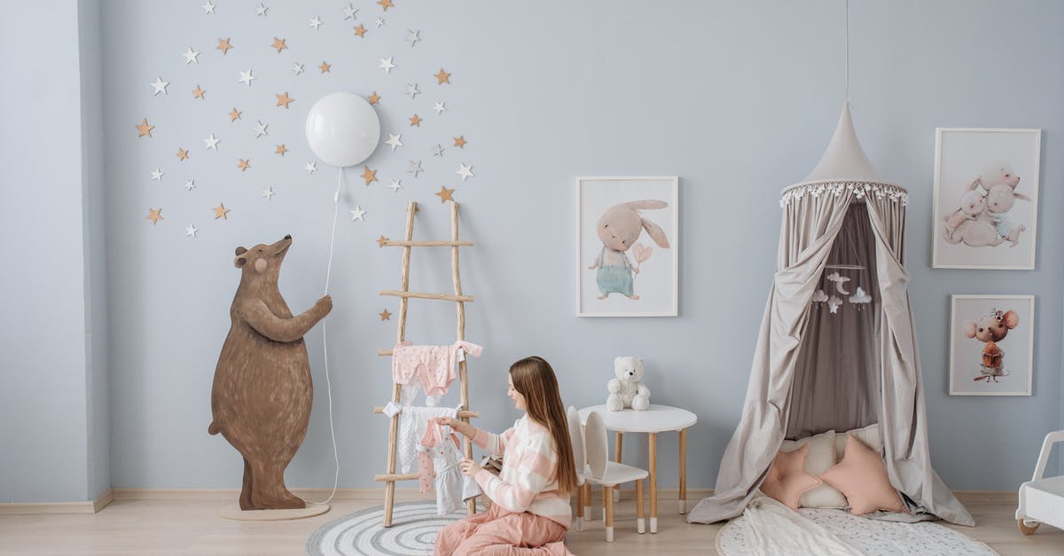 Will clothing effect a baby's S.P.E.C.I.A.L.? -
A Woman Holding Baby Clothes Will clothing effect a baby's S.P.E.C.I.A.L.? -
A Woman Holding Baby Clothes