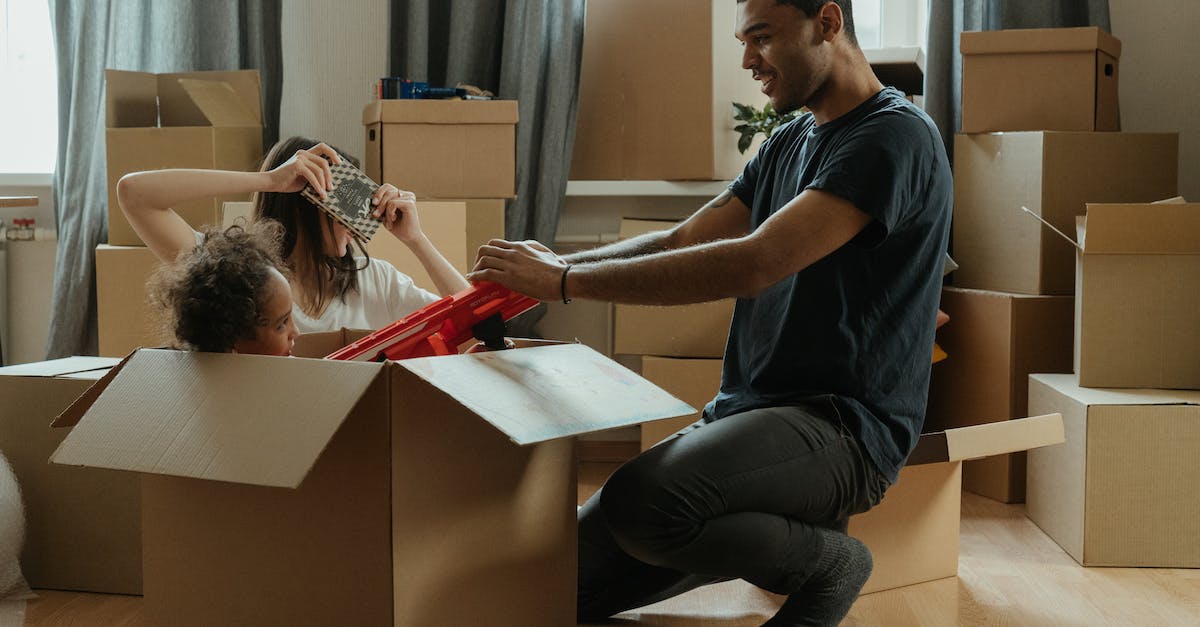 Will deleting the .minecraft folder and restarting the game affect stuff on multiplayer? - Man in Blue Crew Neck T-shirt and Blue Denim Jeans Sitting on White Wooden Table