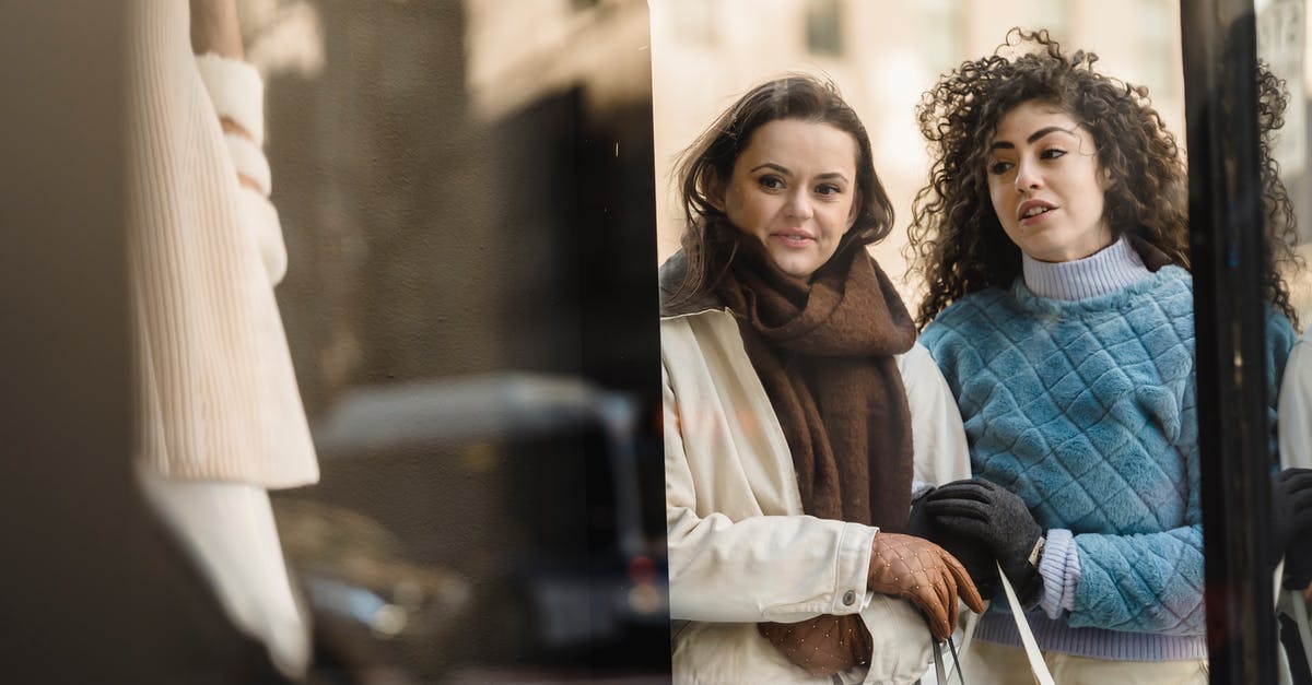 Will Episode Select alter my choices if played all the way through? - Through glass of stylish young multiracial ladies in trendy warm clothes standing near fashion boutique showcase and choosing clothes Will Episode Select alter my choices if played all the way through? - Through glass of stylish young multiracial ladies in trendy warm clothes standing near fashion boutique showcase and choosing clothes