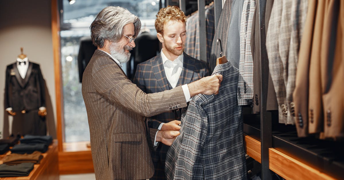 Will I be at a disadvantage for picking a less popular team? - Man in Black Suit Standing Beside Man in Black and White Plaid Suit