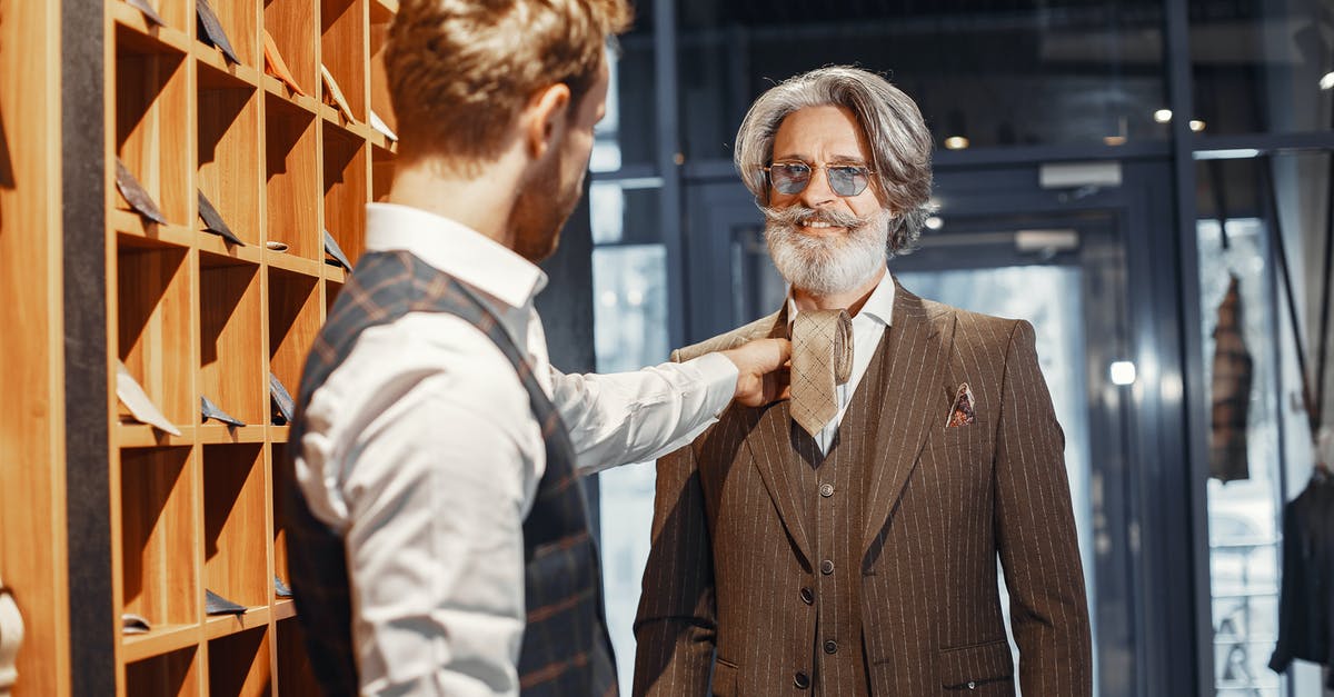 Will I be at a disadvantage for picking a less popular team? - Men Choosing a Tie in a Suit Shop Will I be at a disadvantage for picking a less popular team? - Men Choosing a Tie in a Suit Shop