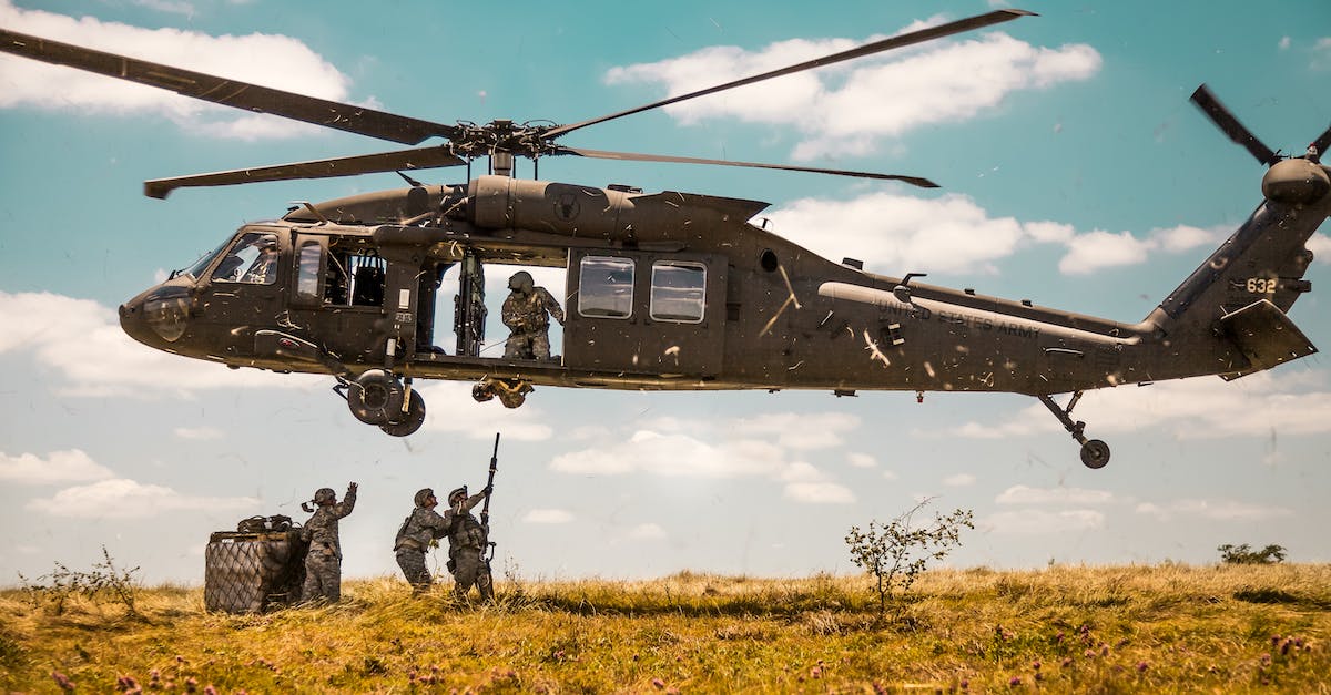 Will I earn bonuses by accomplishing a mission remaining unseen? - A Us Army Helicopter Hovering Above A Group of Soldiers