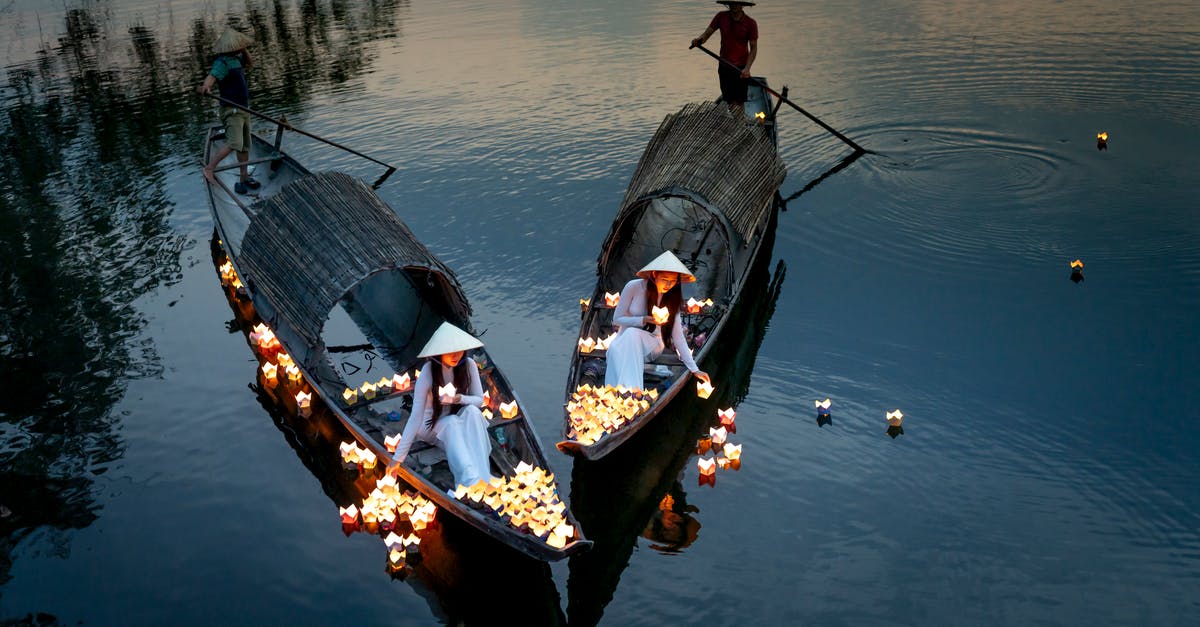 Will I get leavers penalty, even after rejoining the same game? - From above of ethnic female in dresses putting candle lanterns on lake water against anonymous male with oars in boats in twilight Will I get leavers penalty, even after rejoining the same game? - From above of ethnic female in dresses putting candle lanterns on lake water against anonymous male with oars in boats in twilight
