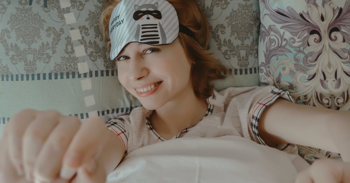 Will knocked-out soldiers in dumpsters and toilets ever wake up? - Cheerful woman with sleep mask lying on bed Will knocked-out soldiers in dumpsters and toilets ever wake up? - Cheerful woman with sleep mask lying on bed
