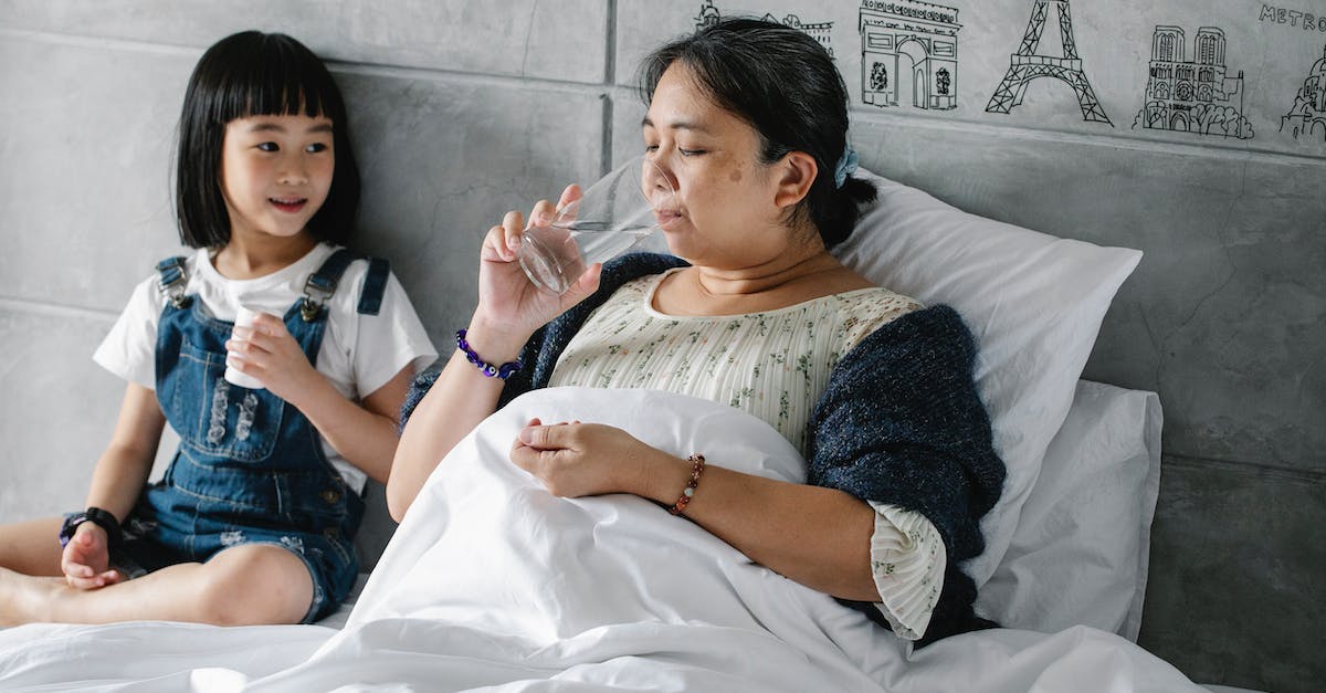 Will leaving corpses lying around upset my prisoners? - Adorable ethnic child giving pills to unhealthy grandmother drinking water in bed Will leaving corpses lying around upset my prisoners? - Adorable ethnic child giving pills to unhealthy grandmother drinking water in bed